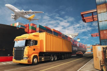 A plane flies over a truck and cargo ship.